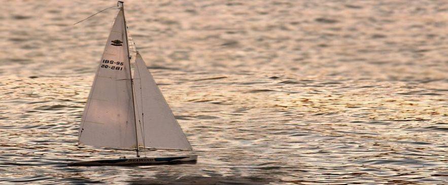 Small sailboat navigating coastal waters during ASA 103 course