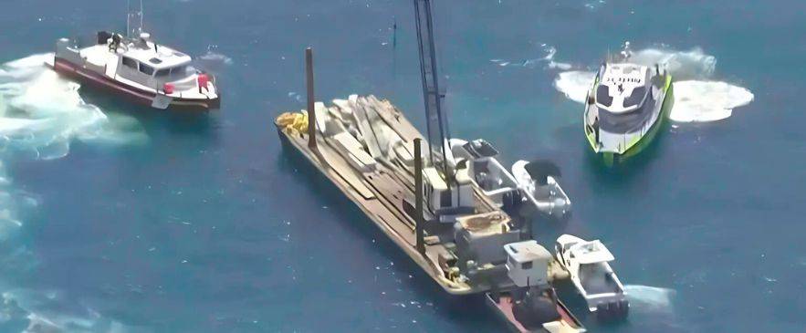 Biscayne Bay Tragedy Imminent sailing collision response — rescue boats around a work barge near Biscayne Bay illustrating collision-avoidance and emergency steps